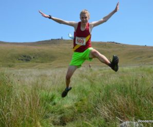 P&B runner Andrew Stemp jumping the beck during Cracoe Fell Race